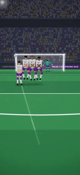 A free kick bending over the wall